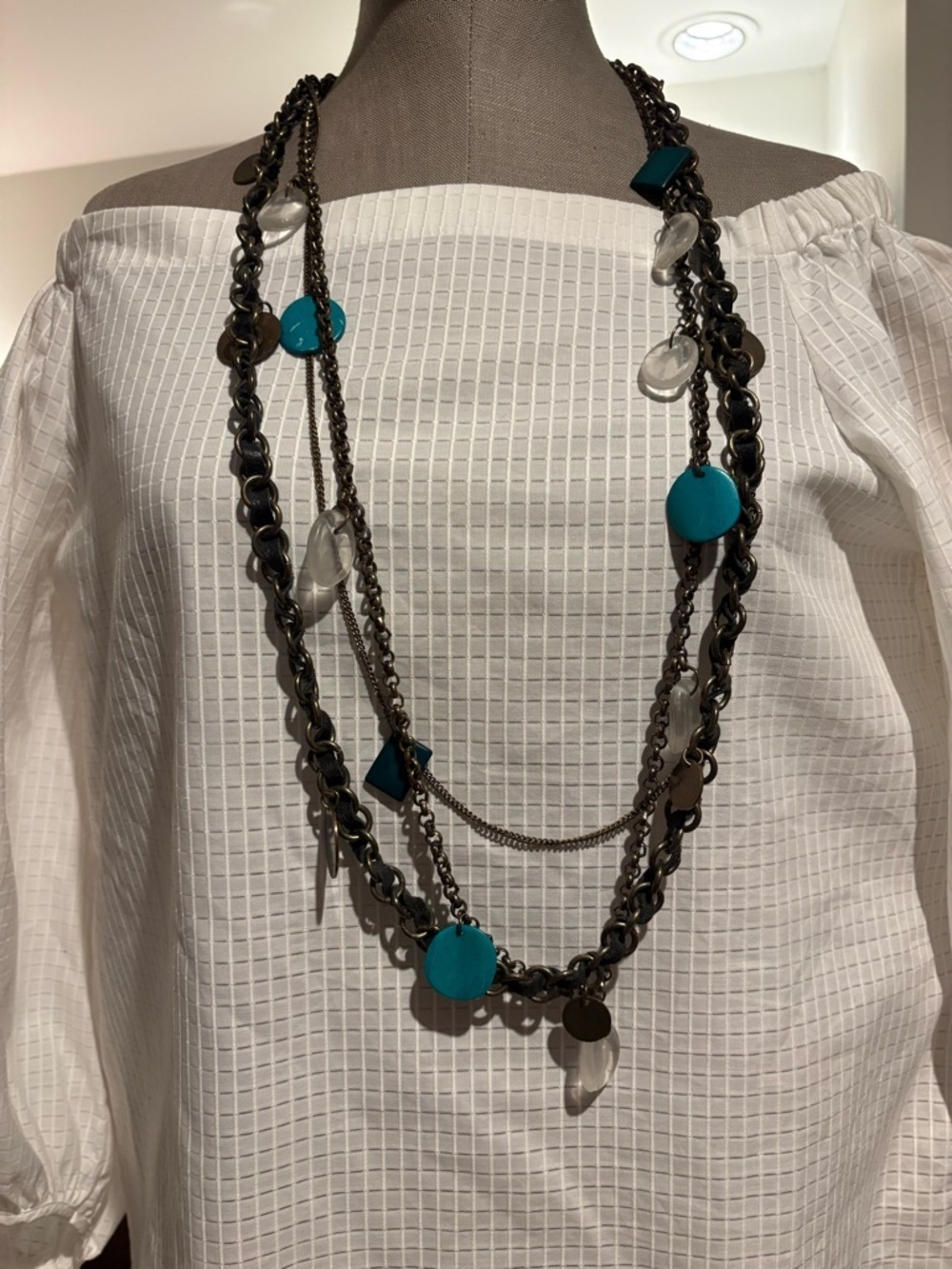 Cassis, Multi-strand necklace, leather and metal, turquoise embellishments